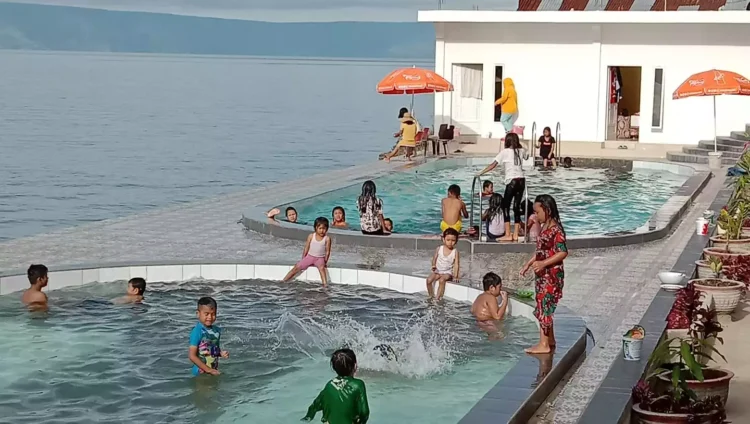 Pantai batu hoda tigaras spot wisata hangat bersama keluarga